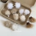 Fluffy Pom Pom Stud Earrings in Six Neutral Designs view 3