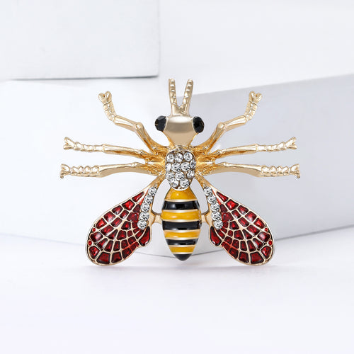 Bee brooch close-up showing striped body and wings