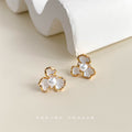 Gold White Three Petal Flower Stud Earrings With Pearl Centers view 4