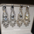 Clear Crystal Chandelier Earrings in Gold and Silver Tone view 1