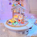 Illuminated Miniature House Scene With Figures and Round Display Base view 1