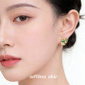 Gold Abstract Face Mask Stud Earrings Green Enamel Eyes view 2