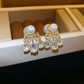 Gold Tone Pearl And Clear Crystal Cluster Stud Earrings view 6
