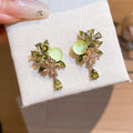 Floral Crystal Drop Earrings in Silver or Green Gold Tone view 7