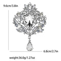 Oversized Crystal Teardrop Brooch With Polished Metal And Sculpted Decorative Details view 11