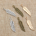 Slender Feather Metal Charms in Four Mixed Finish Options view 2