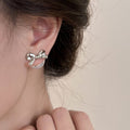Silver Tone Bow Stud Earrings with Pearl Look Round Drops view 4