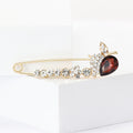 Long Gold Tone Safety Pin Brooch With Red Teardrop Flower view 1