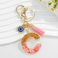 Resin Initial Letter Keychain with Evil Eye and Pink Tassel view 4