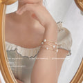 Gold-Tone Twisted Triple Strand White Pearl Bracelet view 3