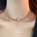 Gold Tone Double Chain Necklace With Star Centerpiece view 3