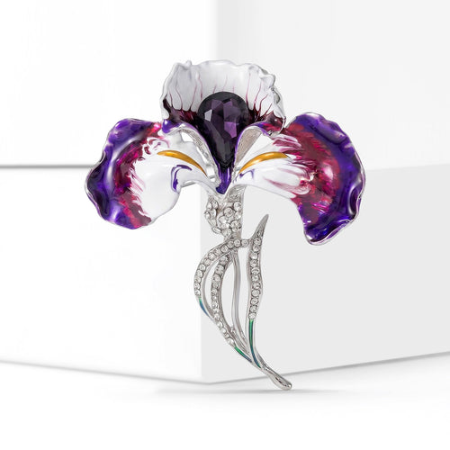 Angled display of the purple iris flower brooch with enamel petals and silver stem