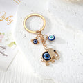 Blue Evil Eye Owl, Elephant and Round Metal Keychains view 7