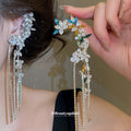 Crystal Flower Long Fringe Single Ear Clips with Polished Metal Tone Details view 1