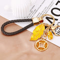 Yellow Leaf and Coin Charm Keychains with Fifteen Braided Strap Options view 11