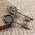 Ornate Key Shaped Round Cabochon Tray Metal Pendants view 4
