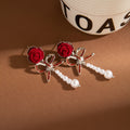 Red and Black Flocked Rose Bow Pearl Look Dangle Earrings view 6