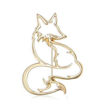 Gold openwork fox outline brooch front view