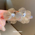 Silver Tone Sculpted Flower Stud Earrings with Polished Metal Accents view 2