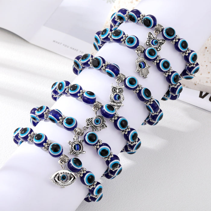 Silver Tone Blue Evil Eye Bead Stretch Bracelets with Six Charms