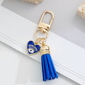 Gold-Tone Rhinestone Evil Eye Keychain with Blue Suede Tassel view 9