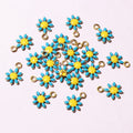 Tiny Enamel Daisy Metal Charms in Twelve Color Combinations view 5