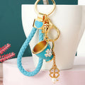 Four Leaf Clover Cup Keychains in Pink and Blue with Braided Loop Options view 2