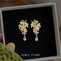 Gold Tone Purple Flower Green Leaf Clear Teardrop Stud Earrings view 1