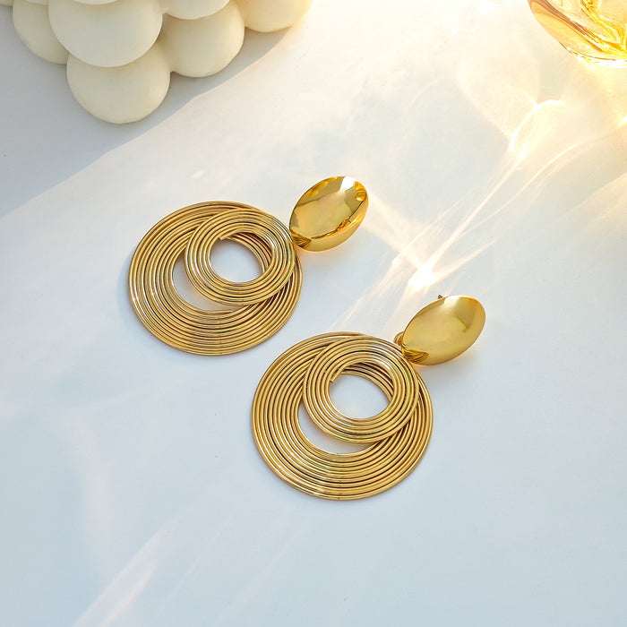 Gold Tone Concentric Coil Ring Statement Dangle Earrings