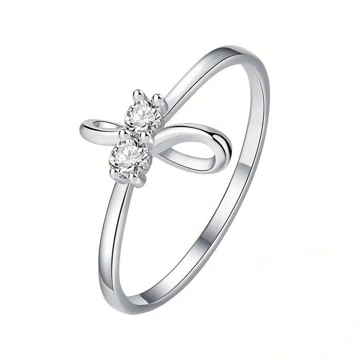 Silver Tone Bow Ring With Clear Floral Stone Center