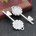 Ornate Key Shaped Round Pendant Bezel Settings in Three Finishes view 3
