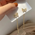 Gold Tone Butterfly Stud Earrings with Chain Tassels view 2