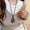 Black Cord Necklace With Layered Teardrop Pendant in Red and Black view 2