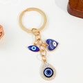 Evil Eye Charm Cluster Keychain with Elephant and Heart Charms view 6