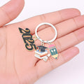 2025 Graduation Cap Book Stack Pencil Enamel Keychain view 3