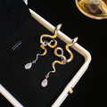 Mixed Metal Snake Drop Stud Earrings with Crystal Tips view 6