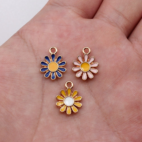 Blue Daisy, White Daisy, Pink Daisy daisy enamel charms in image 1, shown from the front