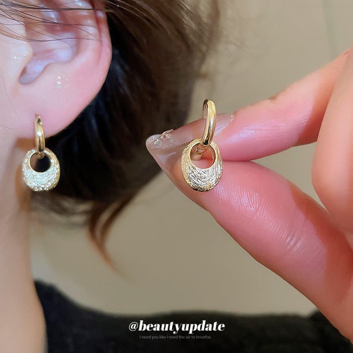 Pair of Metal Tone Gold Tone Sculpted Oval Drop Hoop Earrings