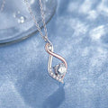 Two Tone Swirl Pendant Necklace With Round Clear Stone view 2
