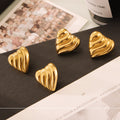 Wave Ribbed Heart Stud Earrings in Gold and Silver view 4
