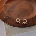 Gold Tone Clear Stone Open Circle Knot Stud Earrings For Women view 1