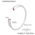 Open Cuff Bracelet With Heart Ends In Gold And Steel Tone view 7