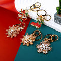 Christmas Boot Bell and Snowflake Keychains with Crystal and Pearl Details view 3