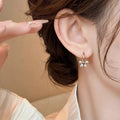 Crystal Flower Hoop Earrings in Rose Gold and Gold Tones view 4