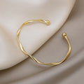 Twisted Metal Open Cuff Bracelet In Four Polished Colors view 3
