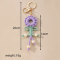 Gold Tone Woven Flower Doll Clip Keychains in Six Colors view 4