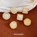 Cream Resin Stud Earrings in Round and Square Shapes view 3