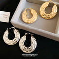 Sculpted Open Hoop Earrings In Gold And Silver Tones view 4