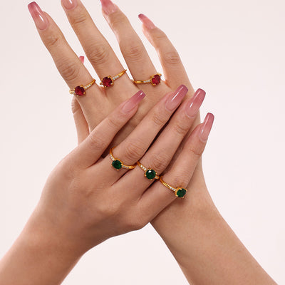 Styled hand view of round zircon open rings in main image 1.