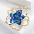 Blue Crystal Camellia Flower Brooch with Gold Tone Outline view 4
